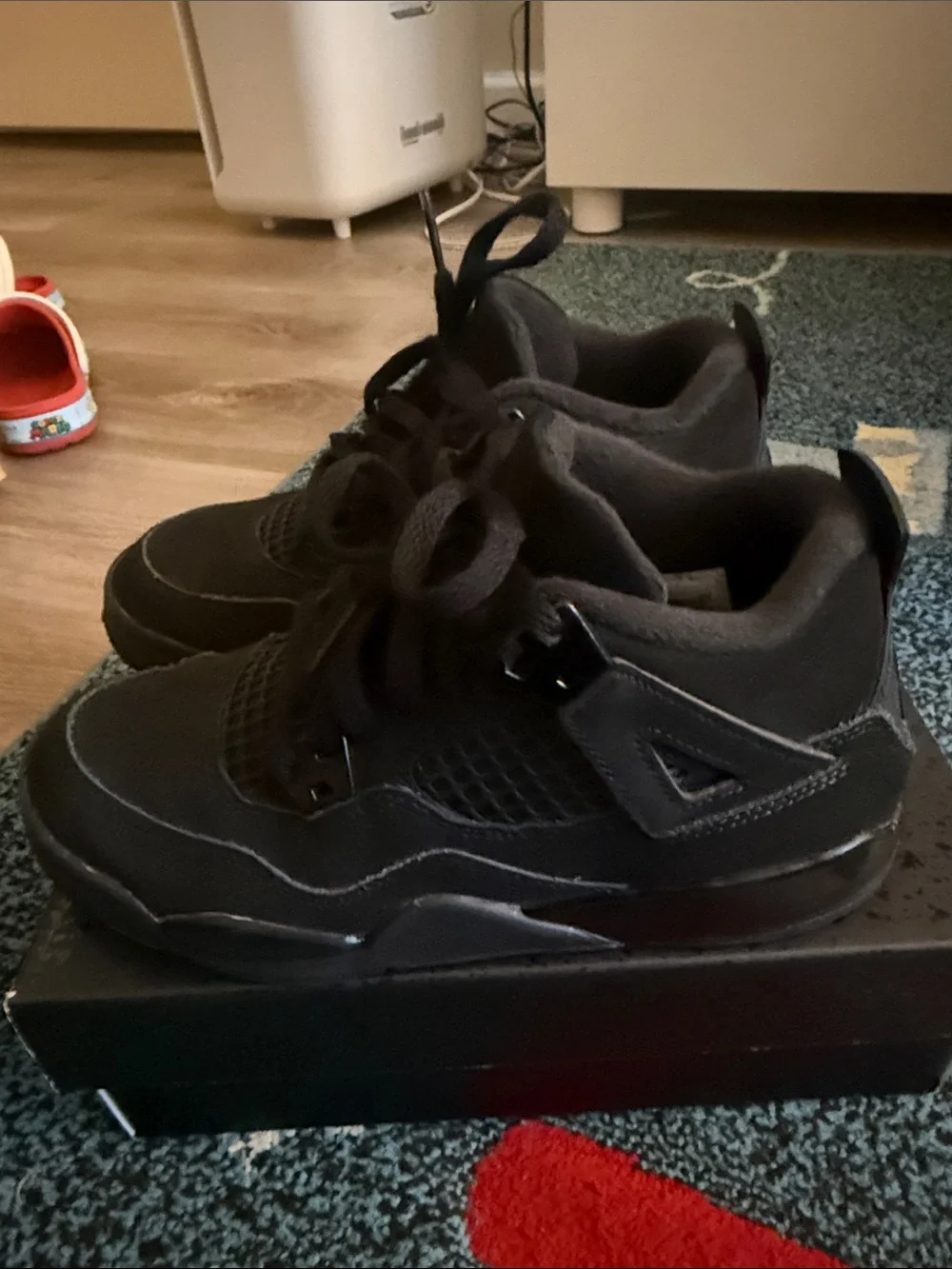 Jordan 4’s All-Black Retro Sneakers